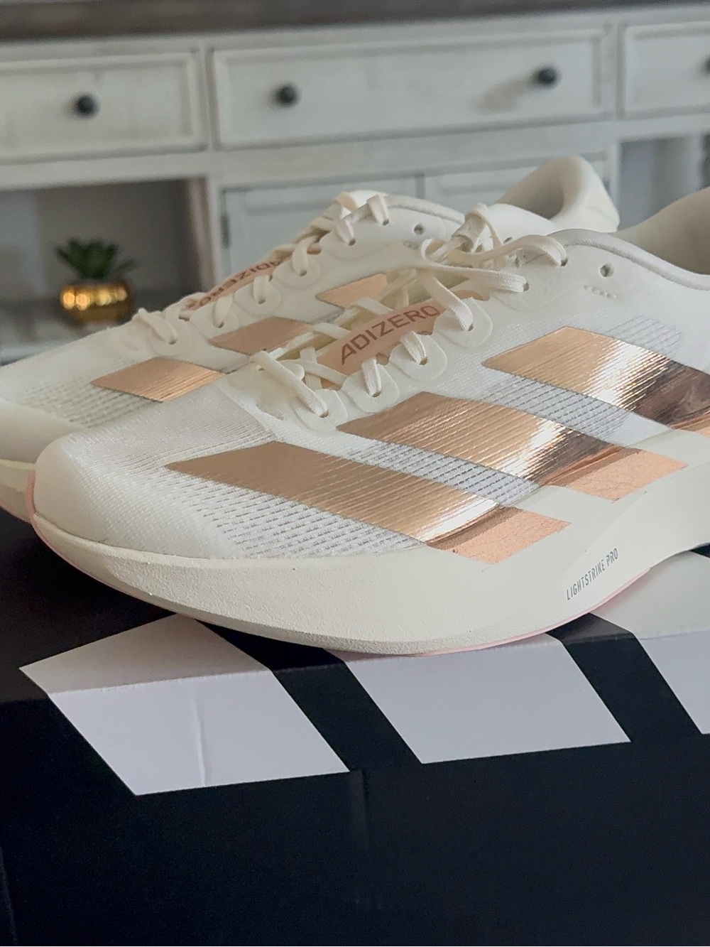 adidas Women’s Adizero Racing Shoe - White with Rose Gold Stripes